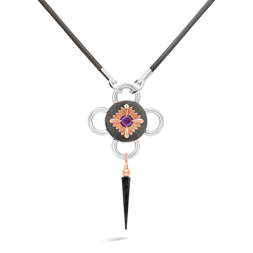 A black silver, rose gold, and amethyst bolt necklace.