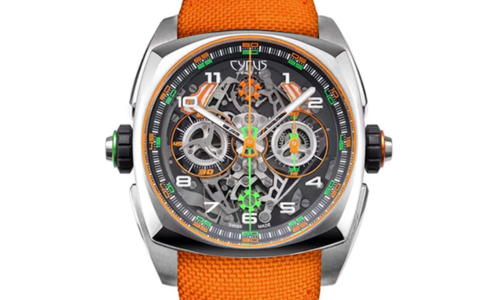 A vibrant and unique Cyrus watch with a skeleton dial and orange textile band, available at Hing Wa Lee Jewelers.