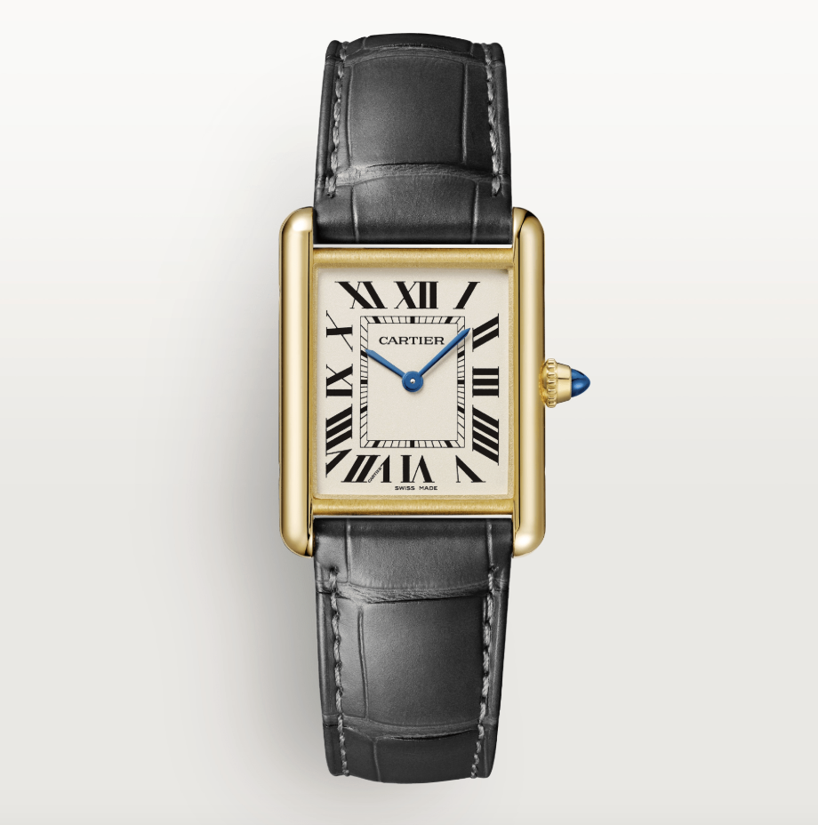 A black leather Cartier wristwatch with Roman numerals and a yellow golf bezel.