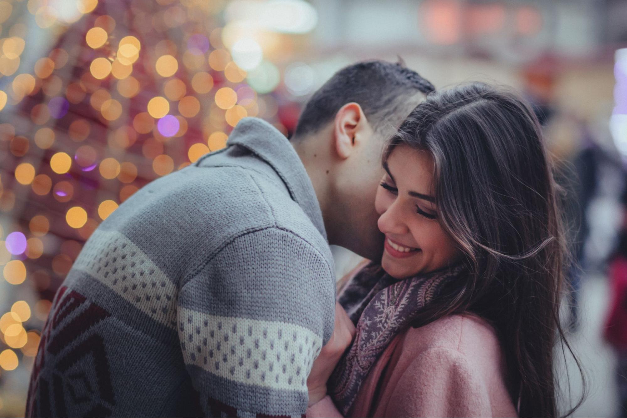 a man and woman embracing on date night