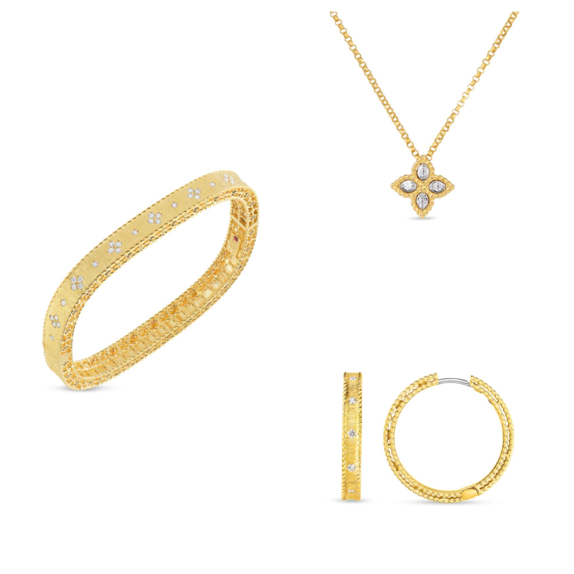 Roberto Coin&rsquo;s gold jewelry set with intricate designs. Includes a textured bangle, a necklace with a flower-shaped pendant, and diamond-accented hoop earrings.