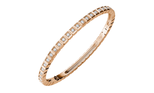 A subtle rose gold diamond bangle from Chopard, available at Hing Wa Lee Jewelers.