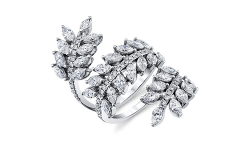A nature-inspired Norman Silverman diamond wrap around ring, available at Hing Wa Lee Jewelers.