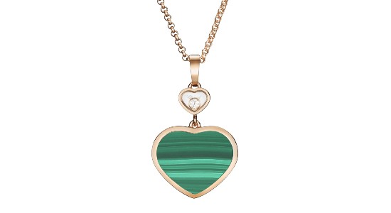 a rose gold pendant necklace featuring a green malachite heart
