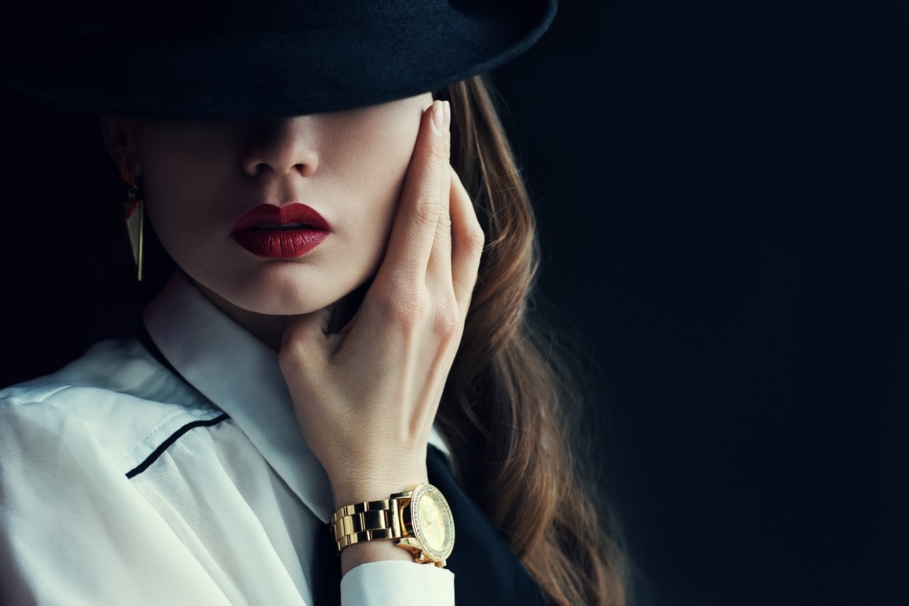 woman with luxury timepiece at hing wa lee jewelers