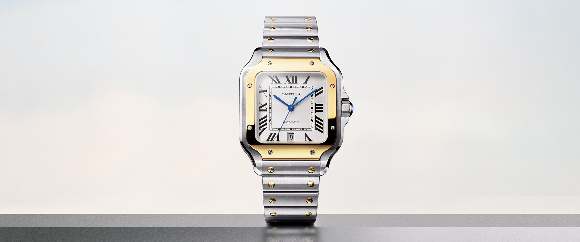 Santos de Cartier watch on a silver background