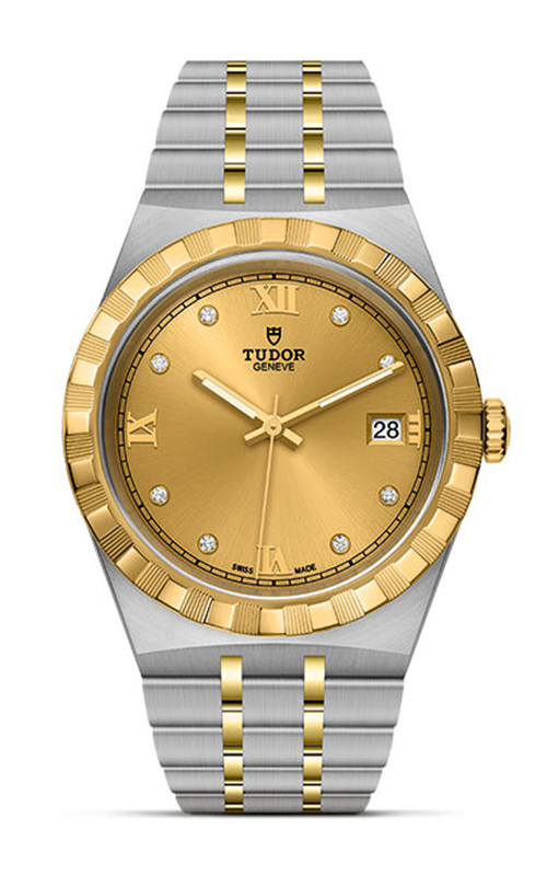A TUDOR watch with yellow gold dial and bezel against a white background