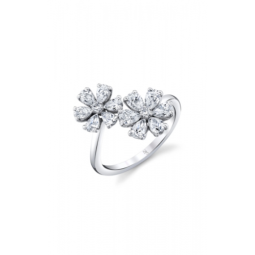 A white gold ring featuring two diamond flower motifs, each with a central diamond surrounded by six pear shaped diamonds.