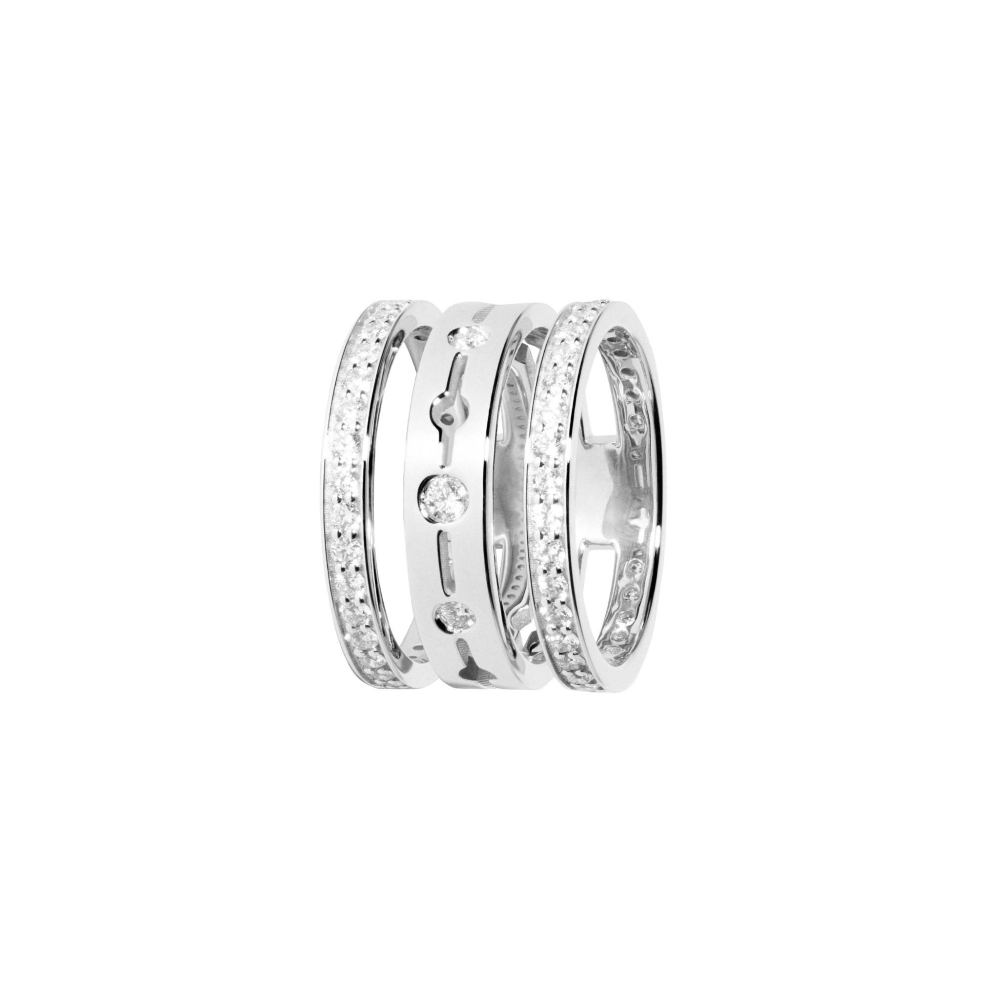A three-band stackable ring in white gold, featuring pav&eacute; diamonds on the outer bands and a sleek diamond-accented center band.