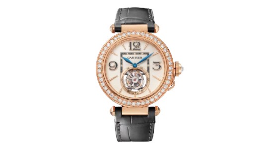 a rose gold watch with blue hands and diamond details by Cartier