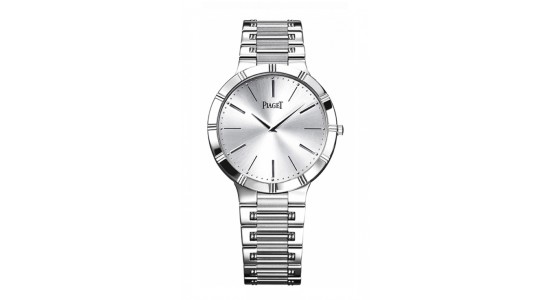 a silver watch with a silver dial by Piaget