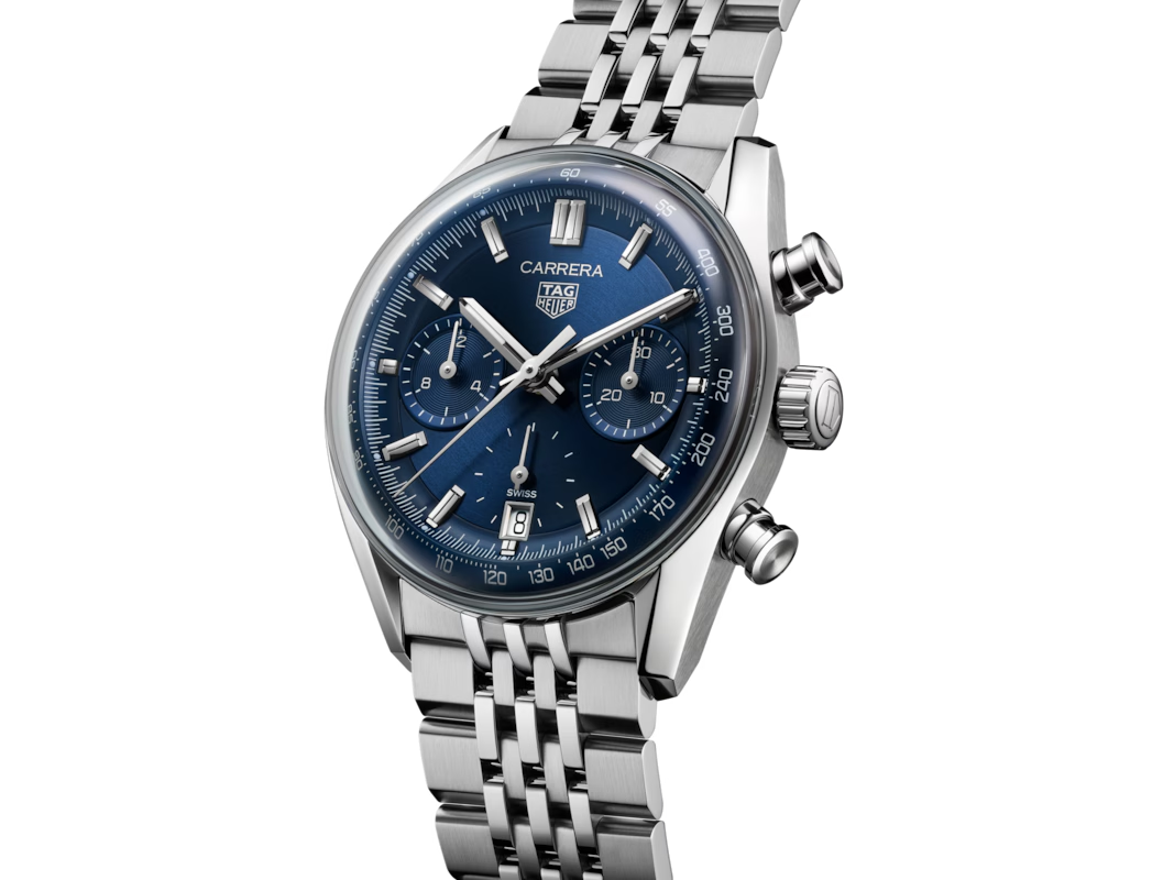 Silver Tag Heuer Carrera watch with a blue dial, chronograph sub-dials, and a stainless steel band, available at Hing Wa Lee Jewelers.