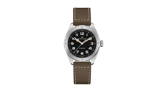 a silver and black watch with a brown strap by Hamilton