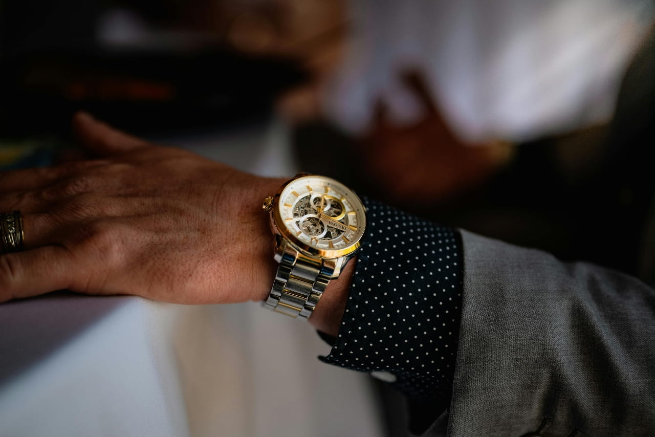 Man's wrist wearing watch